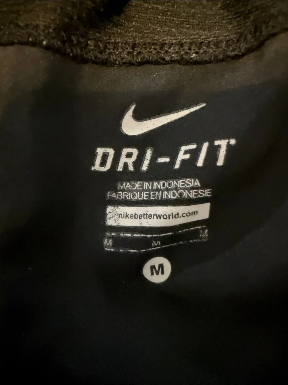 Nike Black Athletic Running Shorts with White Accents and Yellow Number